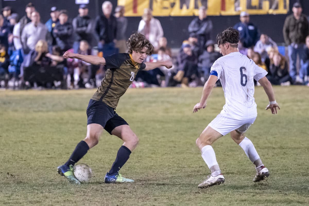 Boys Soccer action photo 1